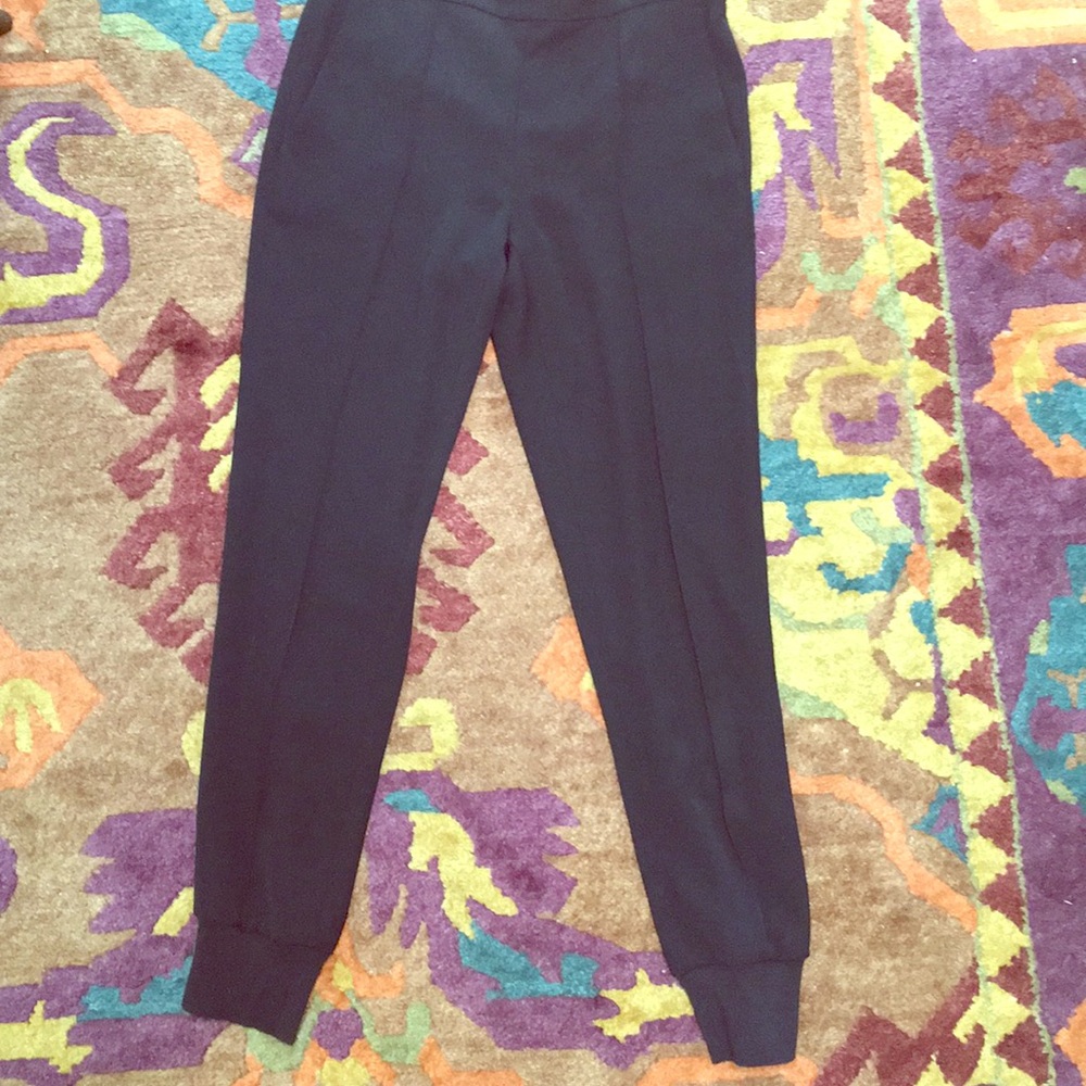 Black haram parts. Polyester. Pockets